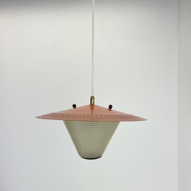 Article: Hanging light Origin: Italy Age: 1950s This fantastic hanging light was designed and produced in 1950s in Italy....