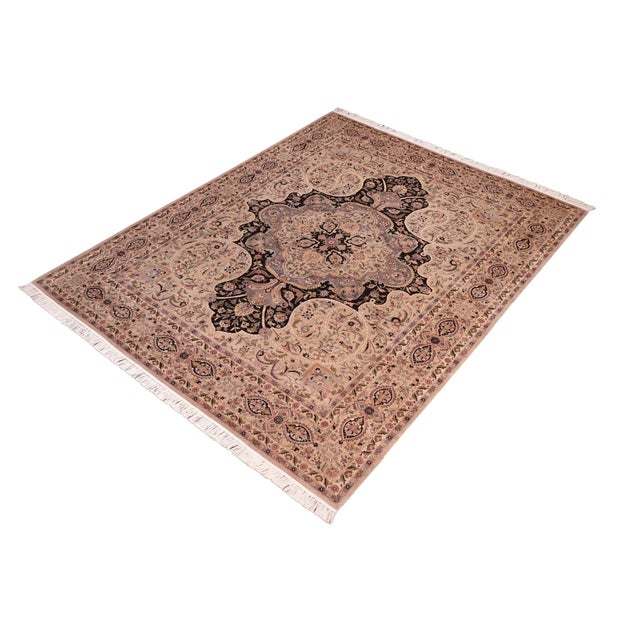 Designed with mesmerizing intricacy and gorgeous color palette, this hand-knotted masterpiece demonstrates the beauty and...