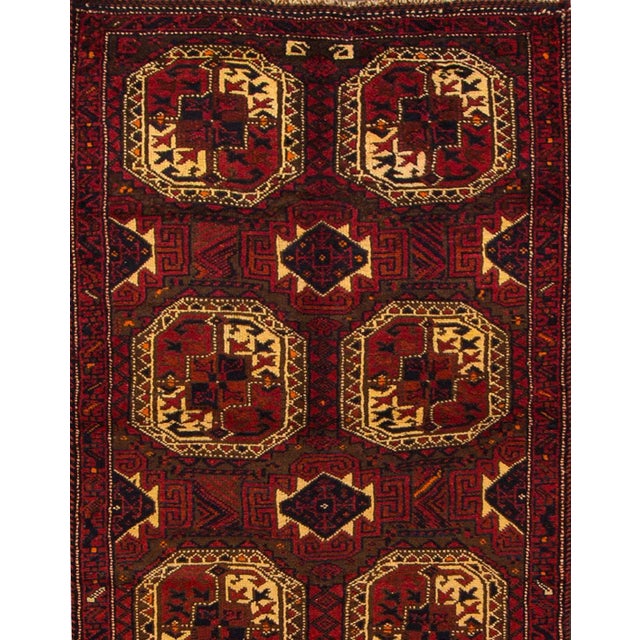 A beautiful Vintage shiraz handmade Wool rug with a red field and multicolor accents in an all-over geometric design. This...