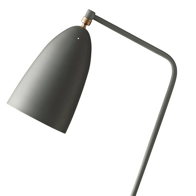 Greta Magnusson Grossman 'Grasshopper' floor lamp in warm gray. Designed in 1947 by Grossman, this is an authorized re-...