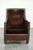 This distinctive antique Art Deco armchair is crafted from a combination of cowhide and velour. The armchair features coil...