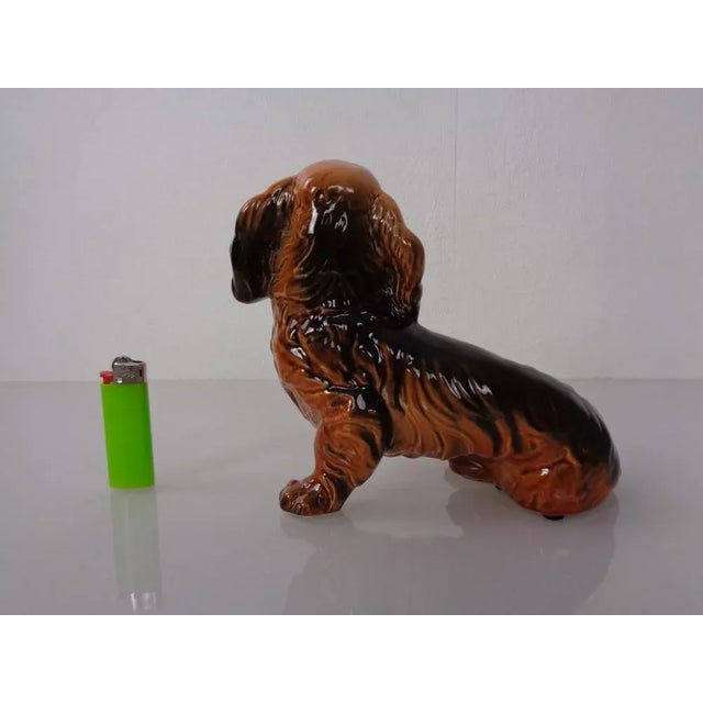 Porcelain dachshund by Goebel from the 1960s. Inscribed on the underside. Excellent condition. This piece has an...
