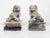 Vintage mid-20th-century pair of traditional carved soapstone Chinese foo dogs featuring a wonderful aged patina. Foo...