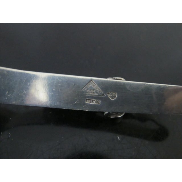 Modernist style F Ramirez Mexican sterling silver pastry server with blossom handle. Measures 8.25" x 2.5" x 2.25". Total...