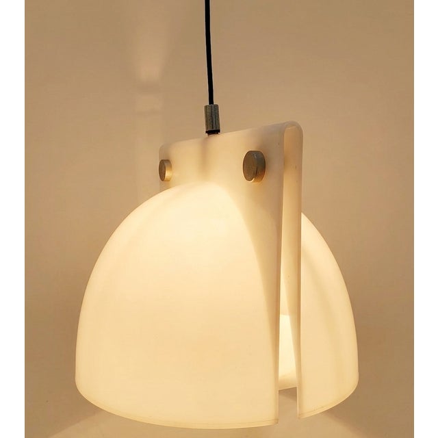 Beautiful orione chandelier designed by ermanno lampa and sergio brazzoli for guzzini vintage 1970s made entirely of white...