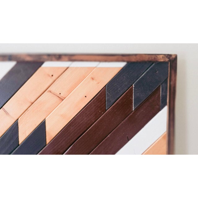 This one‑of‑a‑kind wall piece was crafted from authentic reclaimed wood salvaged from a 1950s U.S. Air Force base, then...