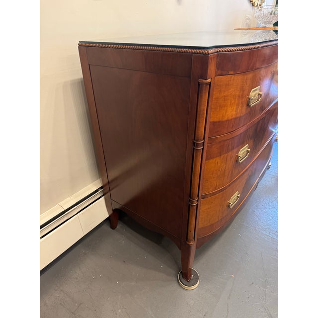 This is a 1940s Berkey and Gay chest of drawers. It has three drawers with lots of storage space. The top drawer has...