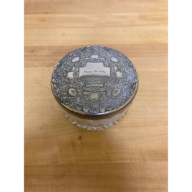 Very pretty makeup jar with puff. The top is engraved with "Happy Birthday Ann". Very pretty vintage piece.