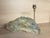 Table lamp formed from a solid block of cut glass, in the style of Jean-Michel Frank (1895-1941). The cut is geometric and...