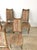 This set of six mid century modern dining chairs features hardwood construction, original walnut finish, six identical...