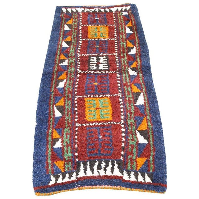 Hand-knotted with care using traditional rug-making techniques, this wool rug blends timeless craftsmanship with a modern...