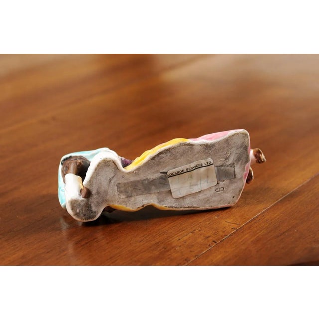 Vintage Petite English Porcelain Figurine Depicting a Young Girl Laying on the Ground For Sale - Image 12 of 13