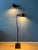 Mid century brown Conelight design floor lamp Ronald Holmes. The two brown spots can be moved up and down the base and...