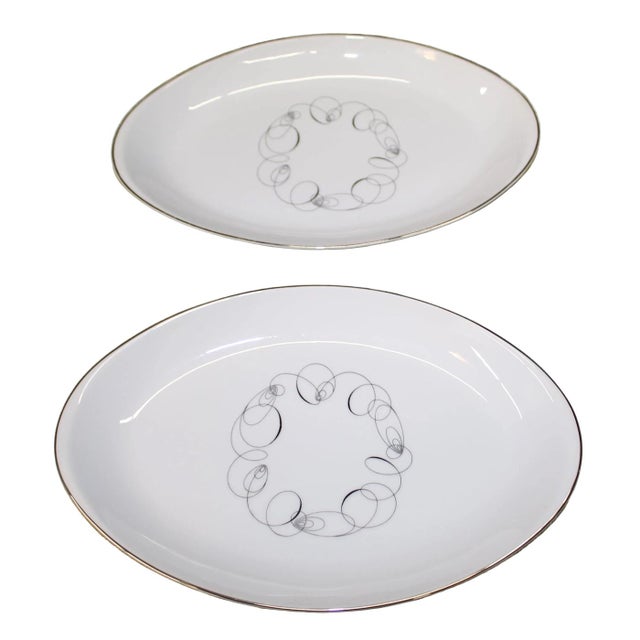 Vintage oval serving platters from the Tempo collection by Meito Japan. Crafted from fine white china, these pieces...