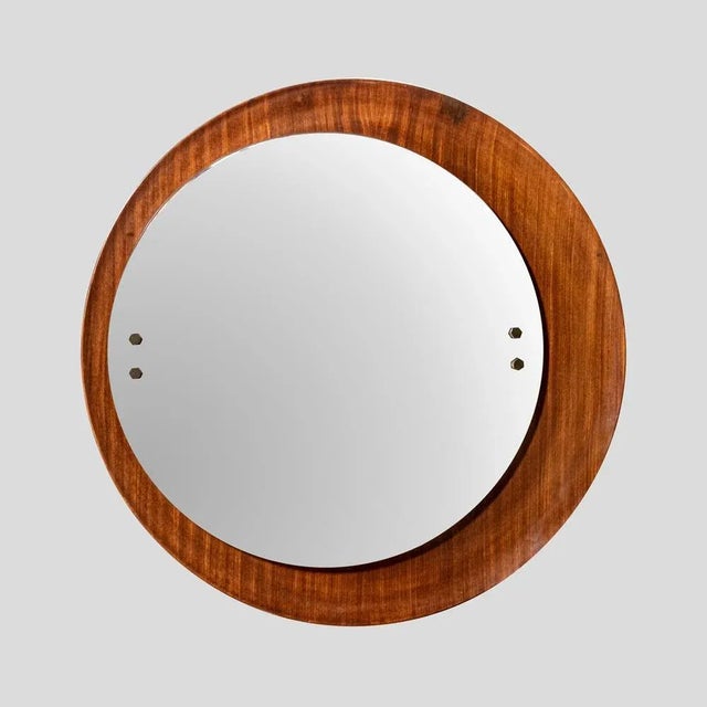 Circular frame off centre mirror on teak plywood curved shape edge. This mirror has 3 positions of installation on the...