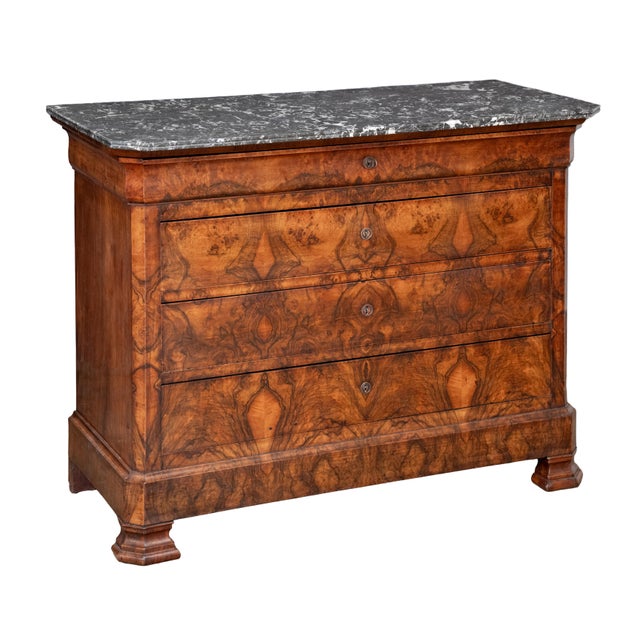 A fine Louis Philippe console chest or commode from France, with rectangular figured marble top over a cabinet with a...