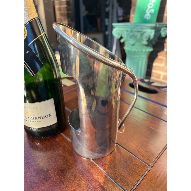 Up for consideration is a beautiful silver wine bottle holder. This would look lovely in your home and it is a great find...