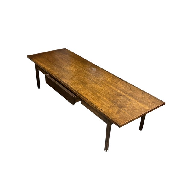Mid-century dark walnut large coffee table by Stanley furniture Banded top surface and side storage drawer. Very good...