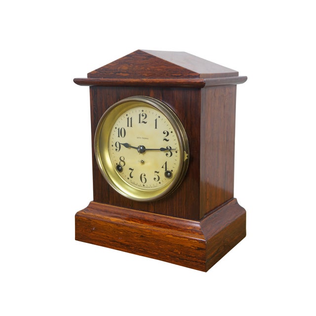 Late 19th to early 20th century Seth Thomas Dana mantel clock. Burl wood style Adamantine (celluloid veneer) case with a...