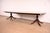 An exceptional Georgian or Regency style double pedestal extension dining table In the manner of Baker Furniture USA, Late...