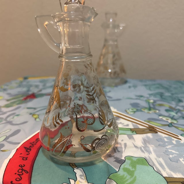 Elevate your tabletop with this stunning pair of vintage Mid-Century Modern oil and vinegar cruets. Designed by the iconic...