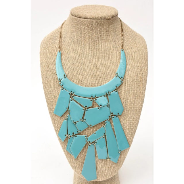 This is part of Chairish’s Costume Jewelry assortment. This fairly contemporary hanging sculptural bib necklace is a gold...