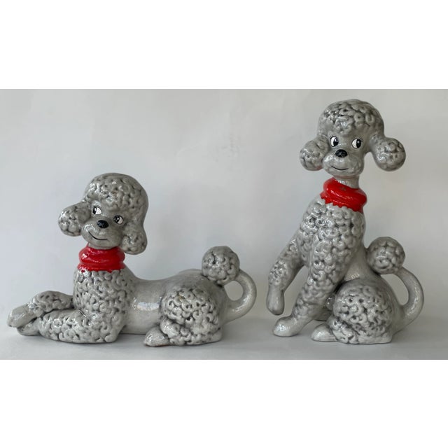This set of mid-century ceramic poodles brings kitsch charm and character to any curated shelf or vignette. mid-century...