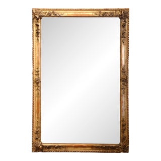 19th Century French Restauration Carved Giltwood Mirror With Floral Decor For Sale