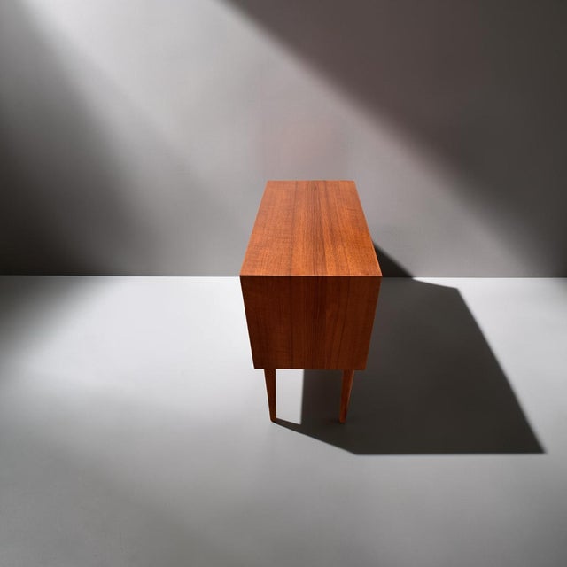 Petite chest of drawers attributed to arne vodder and produced in denmark during the 1960s. executed with three drawers,...