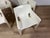 Set of four white plastic Gaudì chairs designed by Vico Magistretti for Artemide in the 1960s. The chairs have been...