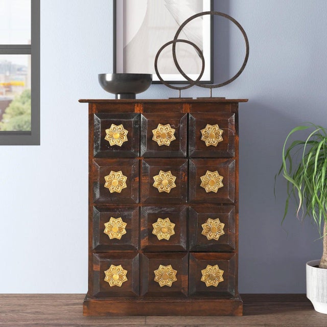 Dimensions: 26" W X 10" D X 35" H This Unique 26" Wide Solid Wood Chest of Drawers, a stunning piece that seamlessly...