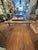 Custom Industrial Flooring Dining Table With Modern Wishbone Steel Legs For Sale - Image 9 of 16