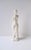 A beautiful white granite marble reproduction of Greek goddess 'Venus de Milo' female figure sculpture in the Greco-Roman...