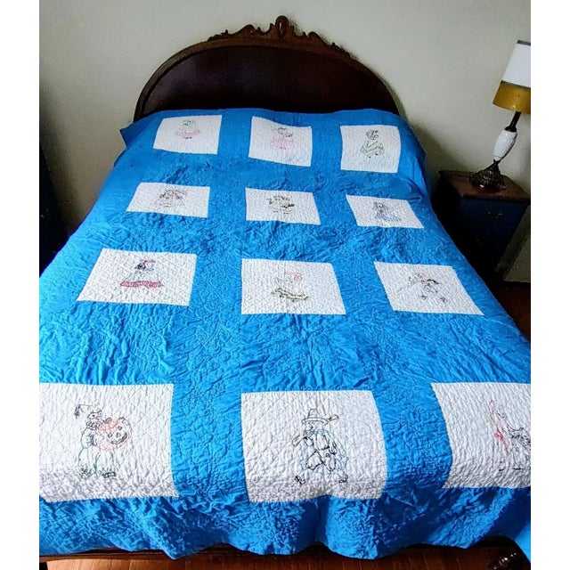 Lovely 1940's era vintage quilt believed to be by the artist LaVerne Bartos. Each square represents a different month of...