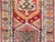 A gorgeous Mid-20th Century Turkish Konya runner with the best Large Scale stylized flowers and geometric shapes woven in...