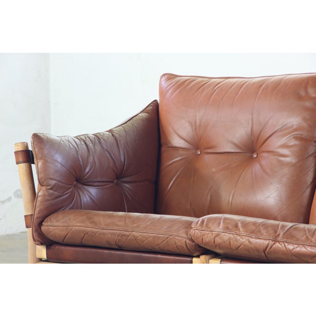 This iconic sofa, designed by Arne Norell in the 1960s and produced in Sweden, exemplifies the very best of Scandinavian...