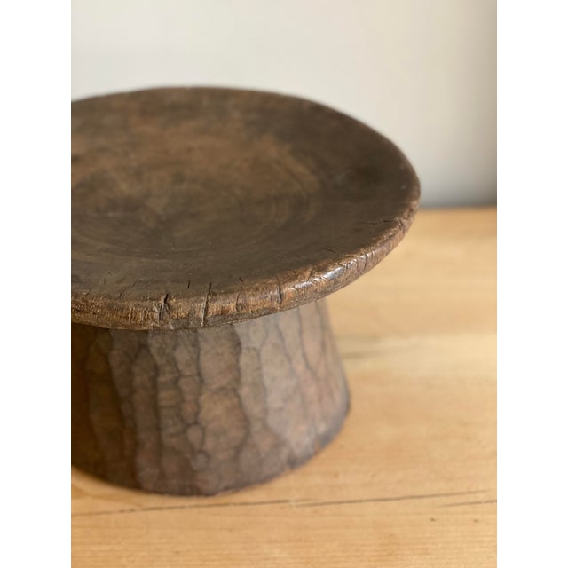 Beautifully mushroom shaped African round primitive brown wood stool. Hand carved