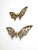 A pair of vintage mid-century brass butterfly wall hangings in two graduated sizes. Each sculptural butterfly features...
