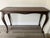 This is a solid oak carved out “sofa table” that was likely hand carved around the 1940’s and is styled after the very...