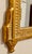 French Louis XV Style gilt wood and gesso wall mirror. It features a rectangular shape with a gilt wood frame, decorative...