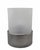 Cylindrical table lamp with diffused light. The upper section is a cylinder made of frosted opal glass. The base is...
