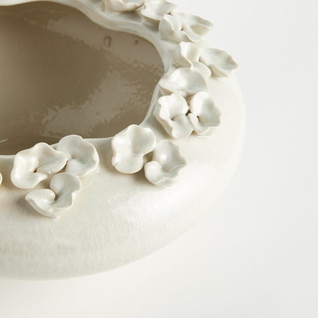 The multi-floral design of this vase is truly extraordinary. The sculpted buds are hand-applied and each piece is uniquely...