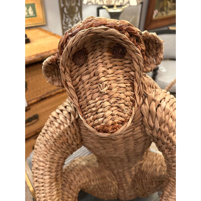 Add a bit of whimsy to your interior with this adorable seated woven rattan & water hyacinth monkey attributed to Mario...