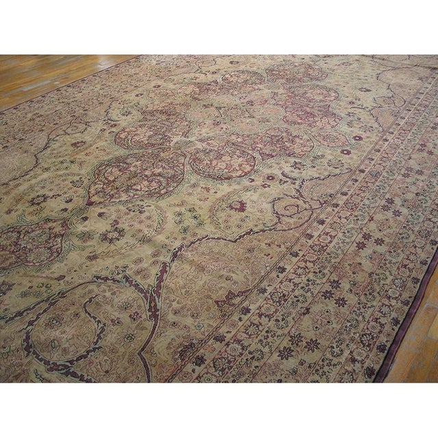 This magnificent oversized fine antique Kerman, dating from the late nineteenth century, is a superlative example of the...