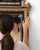 This mirror makes its impression through dark wood frame with gilt crest, ornate. It was made in France during 1880s, a...