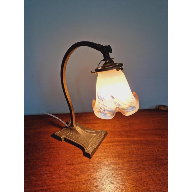 Art Deco desk lamp with a marmoreal glass bobèche signed with acid "Le Verre Français", 1920s-30s. The pieces signed “Le...