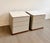 A striking pair of Fidelio Notte nightstands designed by Roberto Lazzeroni for Poltrona Frau, combining exceptional...