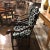 Pair of walnut Louis XIII style arm chair with styled camel back splat center and two front turned hand carved stretchers,...