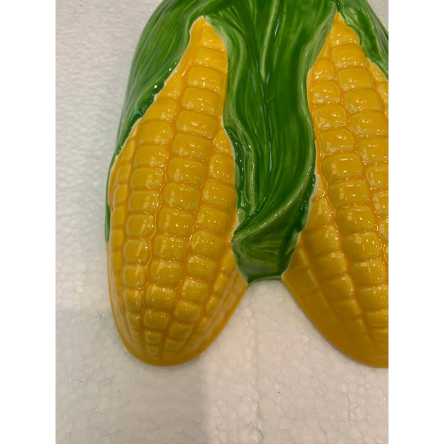 Beautiful Glossy Ceramic Mold of Corn. There is a manufactures sticker -Made in Japan for a company called Cost Plus Inc....