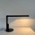 Matt black lamp with intensity variator, black metal structure and base. This piece has an attribution mark, I am sure...